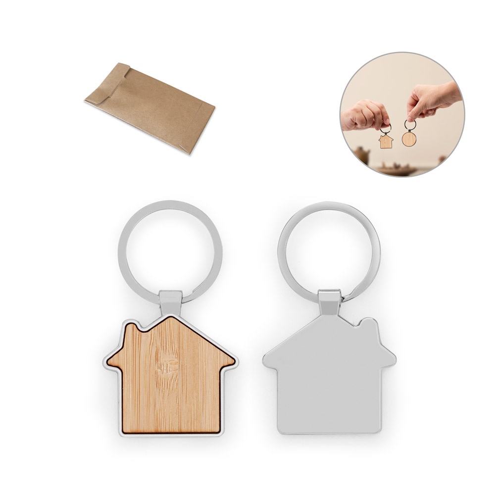 GASTON HOUSE. House-shaped iron keychain, made of zinc and bamboo.